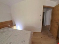 Wohnen, wo andere Urlaub machen – Erstbezug mit Garten in St. Ulrich 6