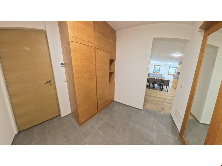 Wohnen, wo andere Urlaub machen – Erstbezug mit Garten in St. Ulrich