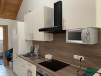 Teilmöblierte Einzimmerwohnung im 2. Stock mit Parkplatz zu vermieten 2